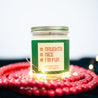 'Naughty, Nice, I'm Fun' 9oz Soy Candle wrapped in red beads and lights. 