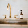 8oz Mount Bachelor Liquid Soap next to a kitchen sink. 