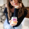 9oz 'Witch Please' Soy Candle being held by a young woman. 